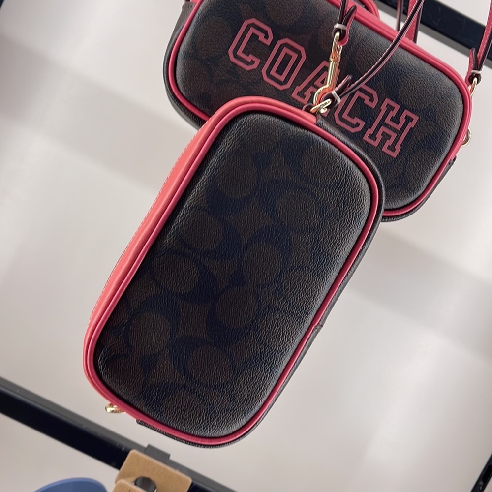 Coach Jamie Wristlet In Signature Canvas With Varsity Motif
IM/Brown/Watermelon - Picture 14 of 16